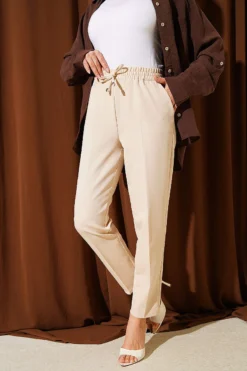 Belted Tapered Pants with String Detail Stone