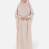 Wholesale Jilbab Medina Silk — cream one-piece prayer jilbab with integrated khimar on model