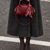 Oval-shaped handbag with a scarf accent Burgundy