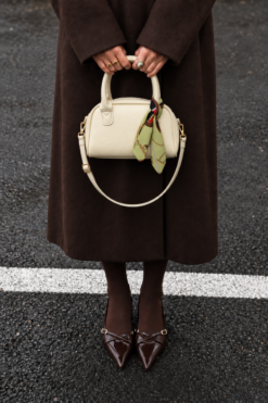 Oval-shaped handbag with a scarf accent Yellow