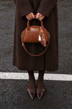 Oval-shaped handbag with a scarf accent Tan